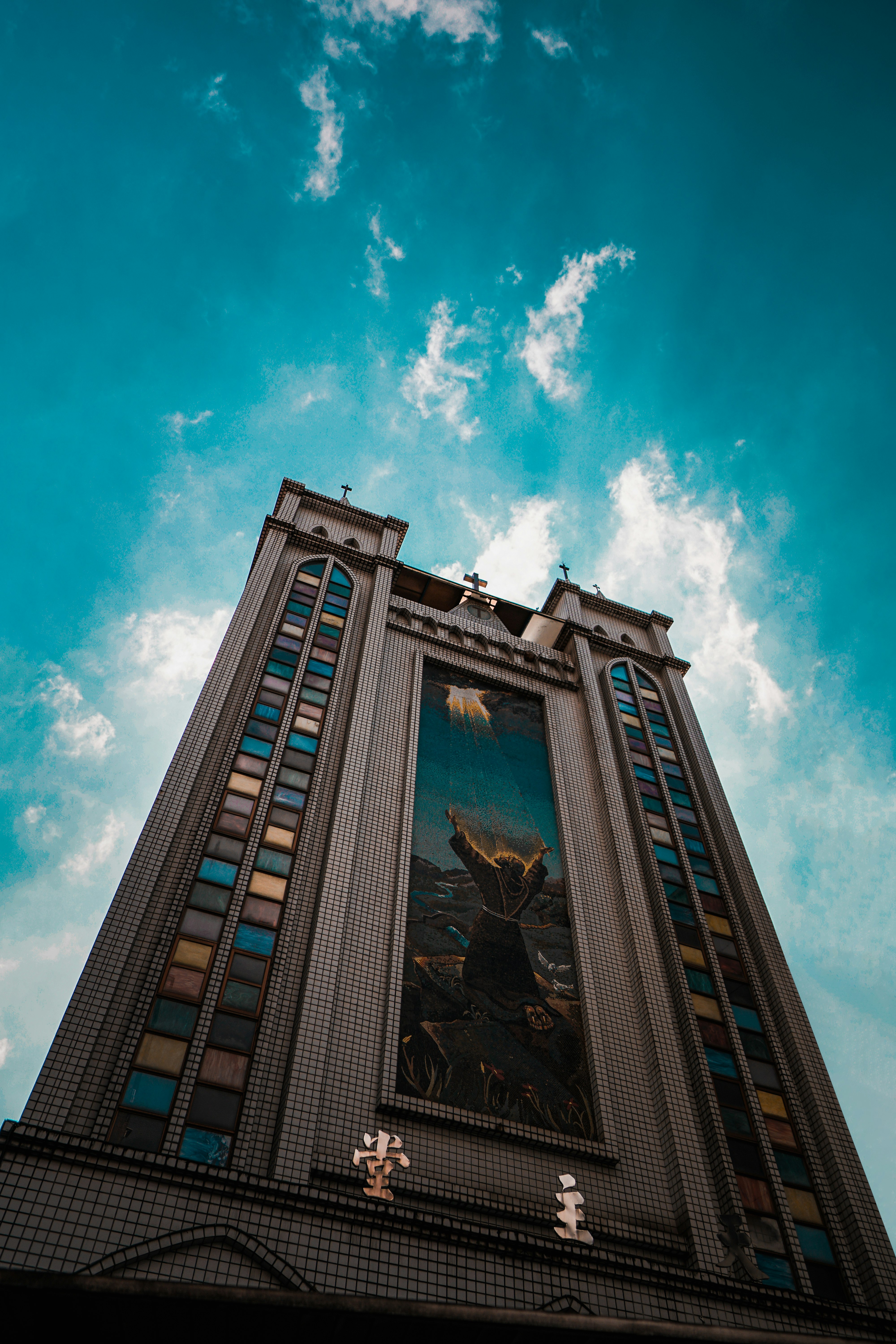 black concrete building under blue sky during daytime